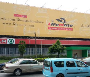 Wall Panel Parking By Lot Facing The Hotel Building Along International Airport
