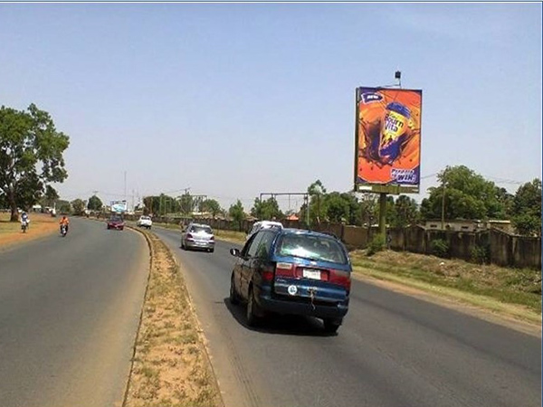 Portrait Billboard Along Abu Road Zaria, Kaduna