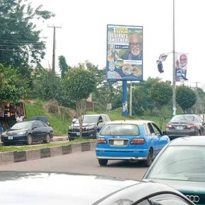 Portrait Billboard Ado-Owo/Bank Road by Akure Shopping Centre, Ondo State