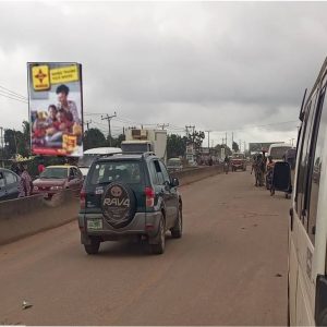 Portrait Billboard Ibadan Ife Road by Alakia Market, Ife Ibadan, Oyo State.