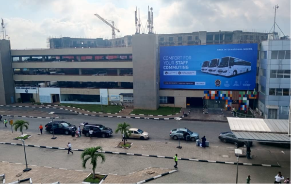 Wall Drape By Entrance Road inside MMA2 Parking lot