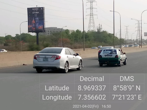 Portrait Billboard Airport Road By Voice Of Nigeria, Abuja