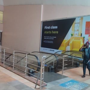Backlit Billboard Escalator Coming From Ticketing Hall and Going to Final Departure , Airport,Lagos