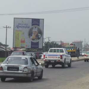 Portrait Billboard East-West by Bori Camp Army Barracks Facing Eliozu Flyover PH, Rivers State