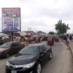 Outdoor Billboards advertising agency in Lagos Nigeria - DSTV- BRT Branding and Digital Marketing 63 Portrait Billboard Along Itam market by Calabar itu road, Awka Ibom.