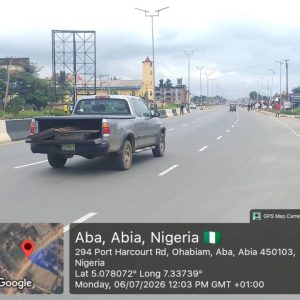 Portrait Billboard Port harcourt road by coa cola depot Bus stop, Aba, Abia State